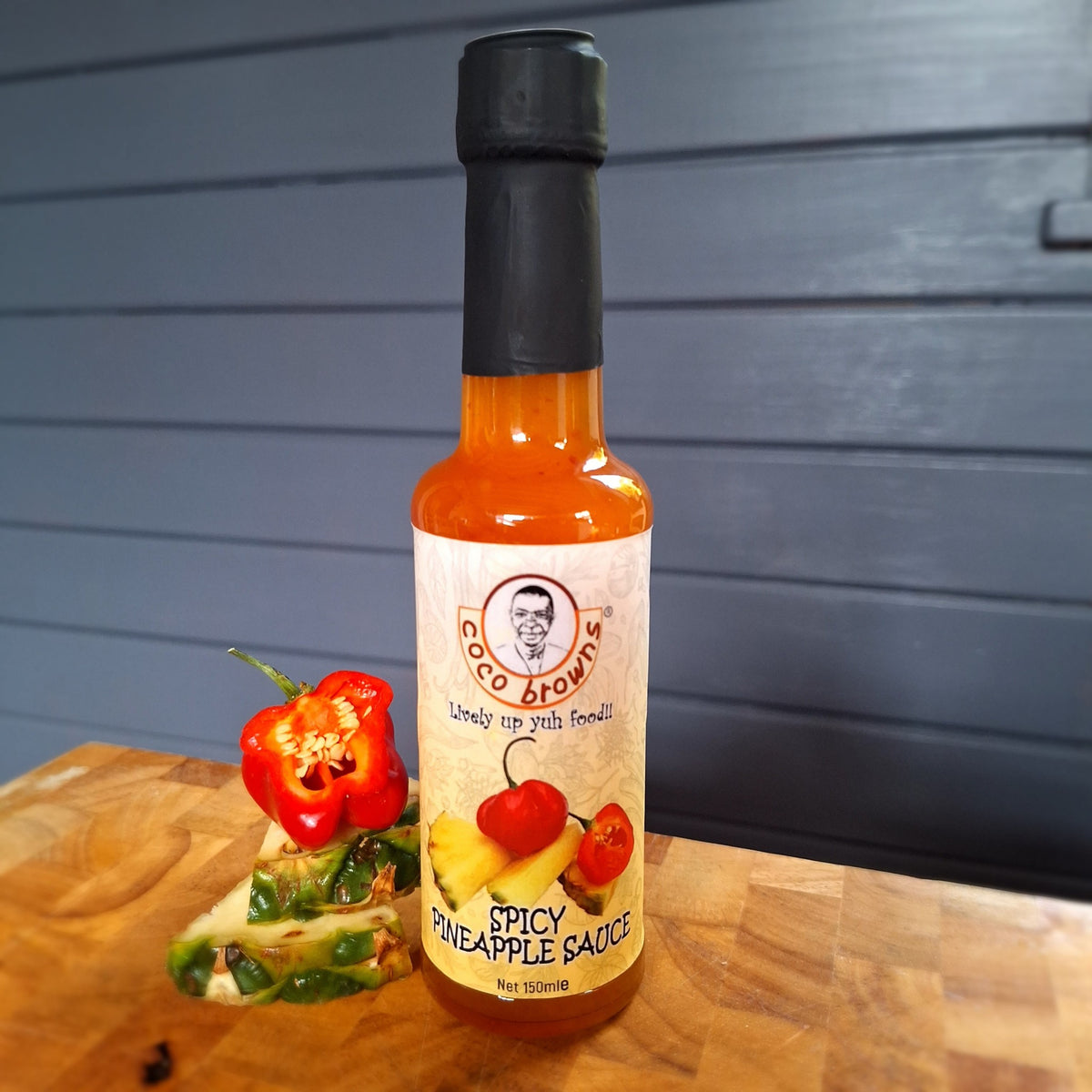 Coco Browns Spicy Pineapple Hot Sauce with fresh pineapple and Scotch Bonnet