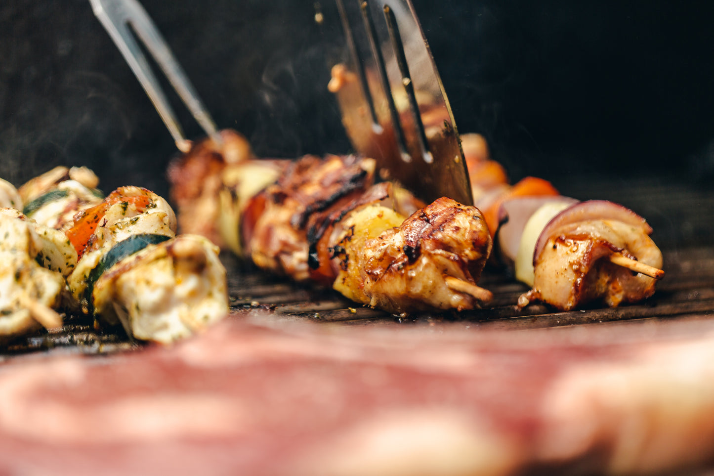 Delicious chicken and veggie kabob on the grill seasoned with Jerk Rub and glaed with Spicy Pineapple Sauce